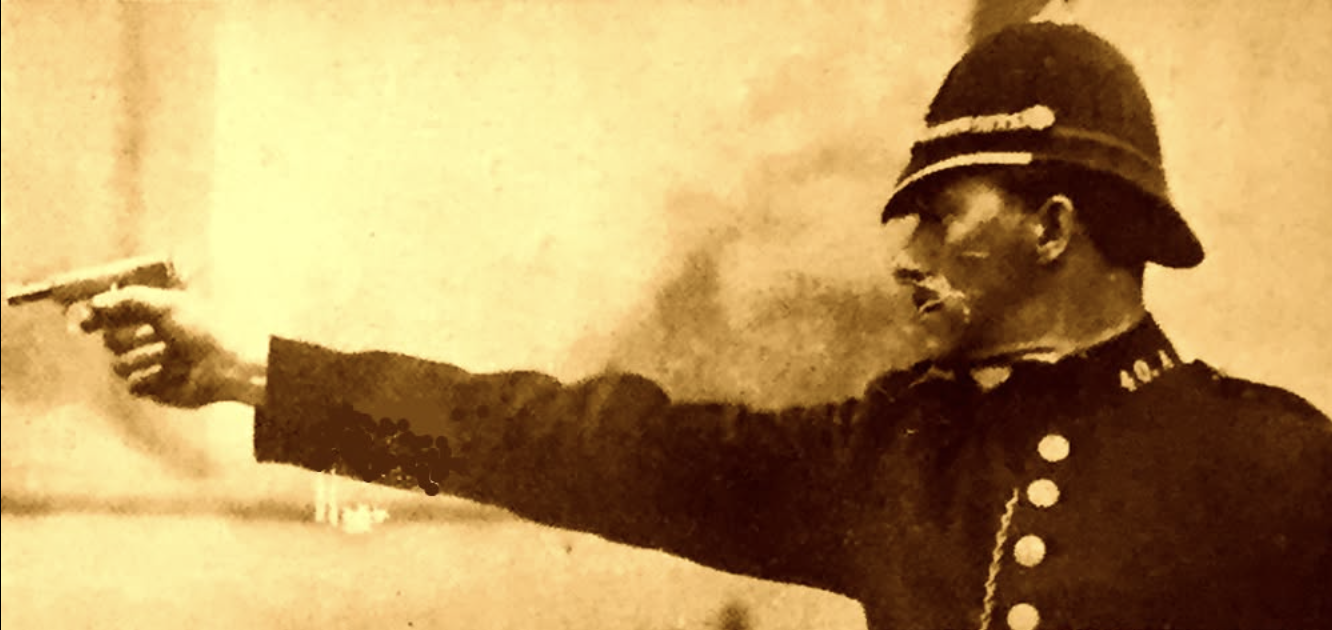 A Dublin Metropolitan policeman aiming a pistol